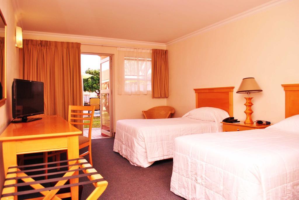 The George Hotel Manzini Habitación foto