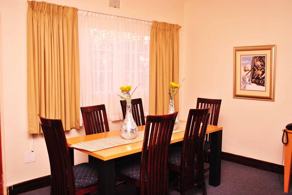 The George Hotel Manzini Habitación foto