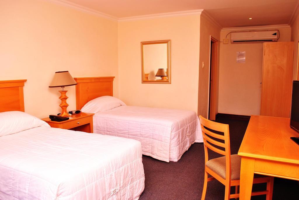 The George Hotel Manzini Habitación foto